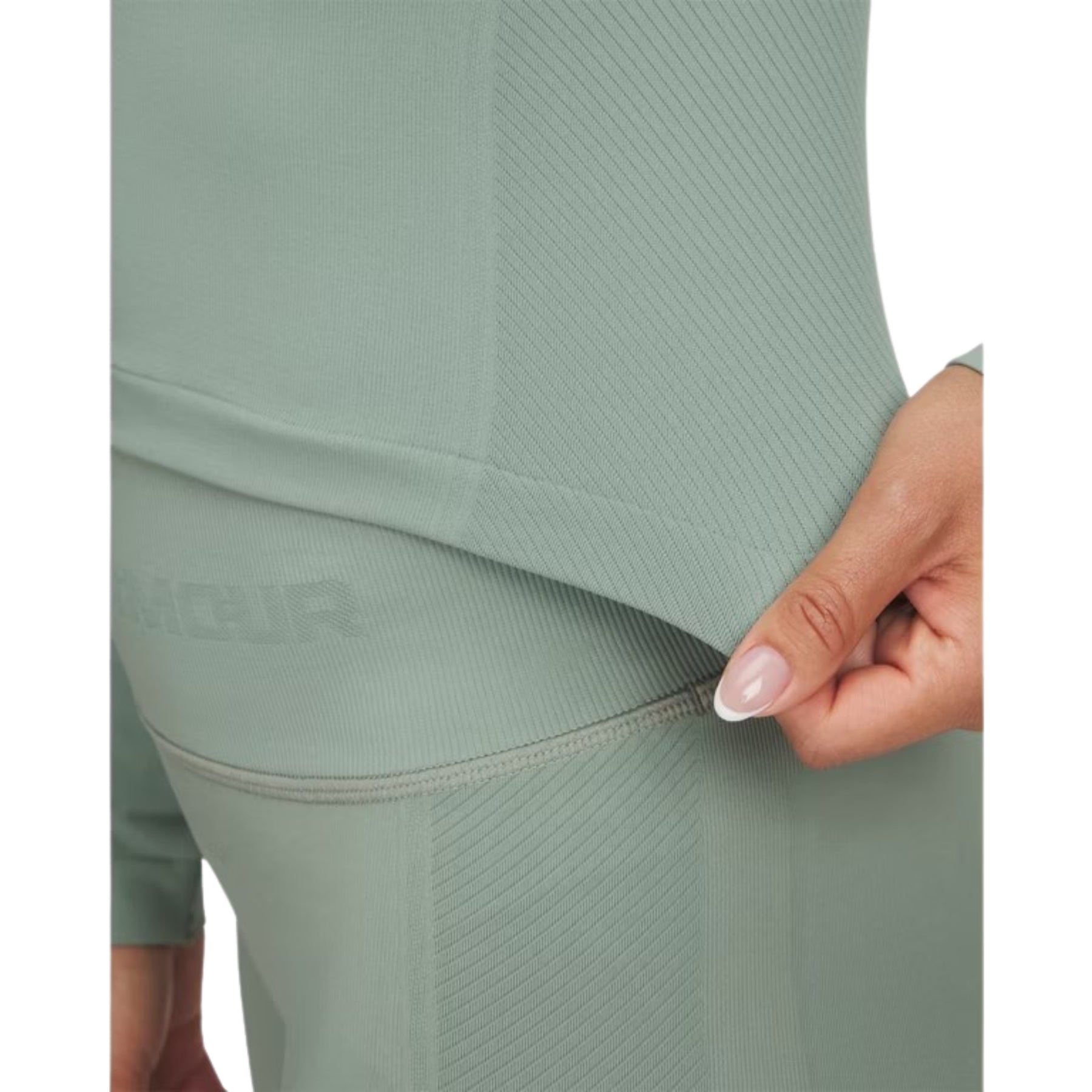 Under Armour Train Seamless Long Sleeve Womens Tee 2025: Silica Green/White